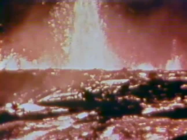 A volcano is spewing fire and lava all over