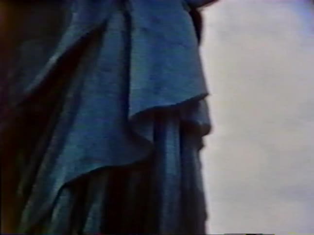 A statue sits on a field