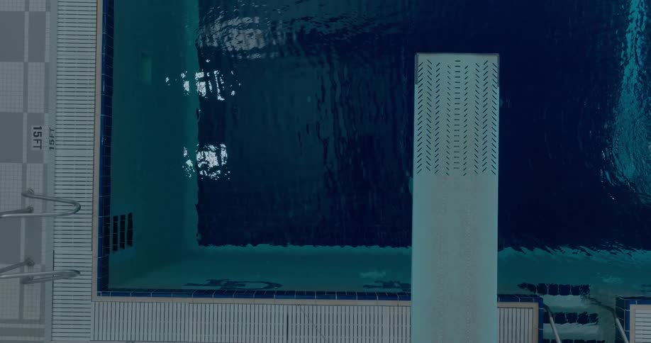 An indoor swimming pool with a light ripple effect