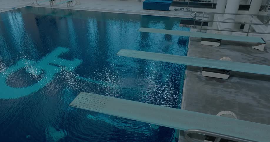 Diving boards aligned over the indoor pool at the georgia tech aquatic center