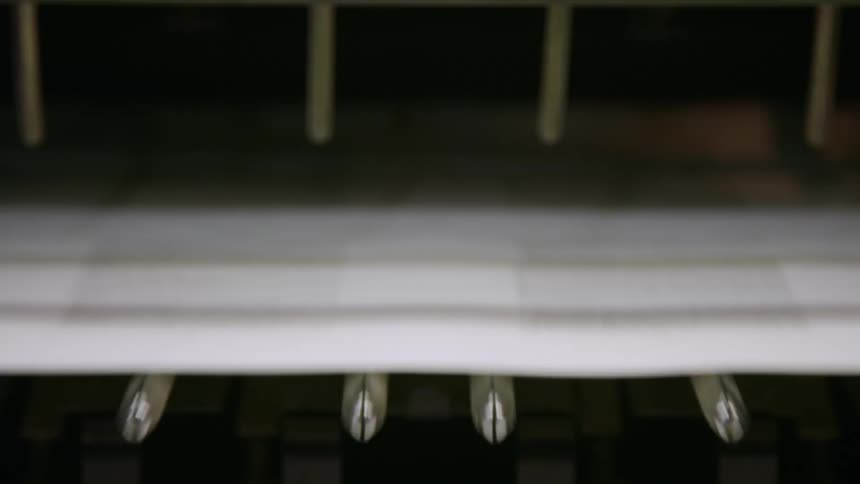 A machine prints a page of text