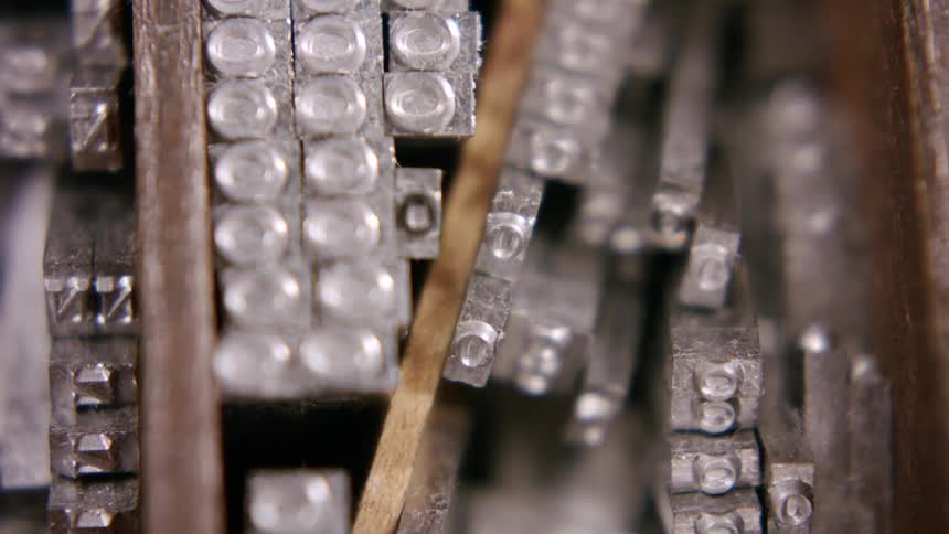 Metal typesets are stacked together