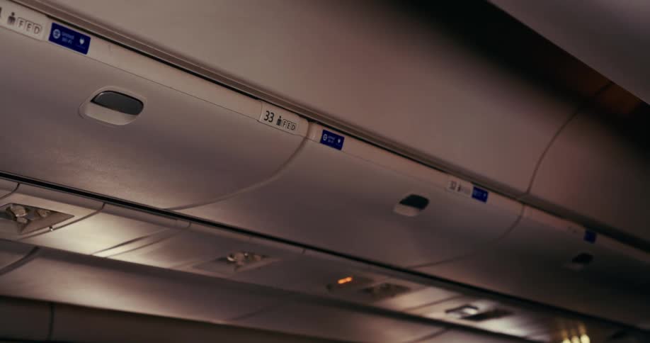 The overhead bins in an airplane