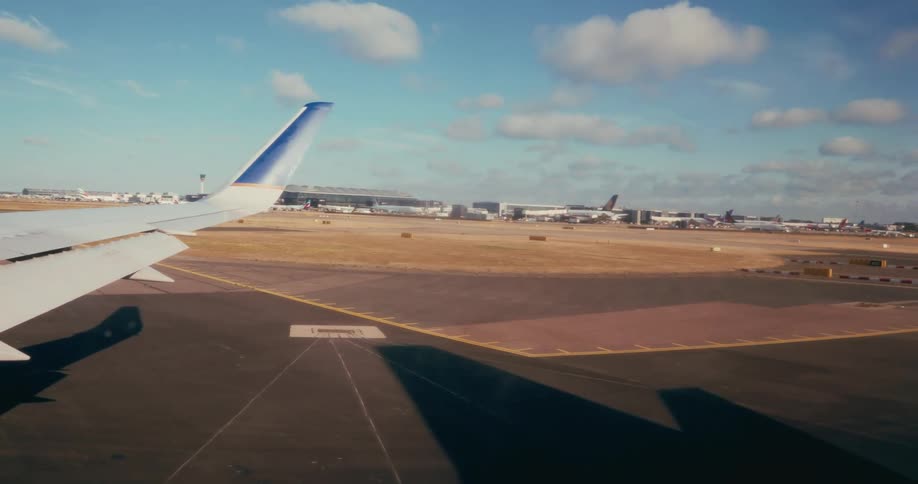 An airplane turning onto the runway