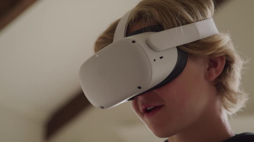 A person wears a virtual reality headset