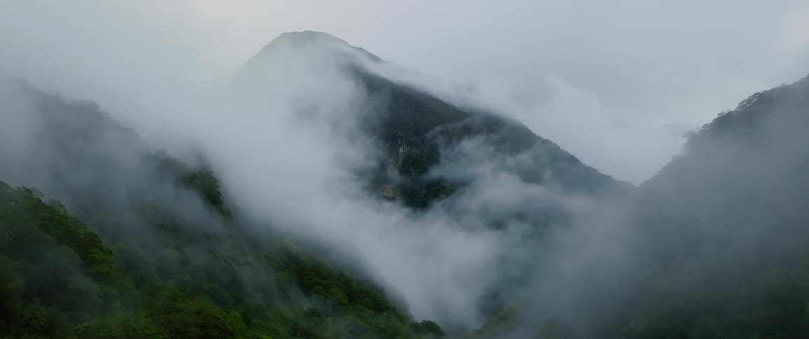 Aerial landscape of a mountain range with fog