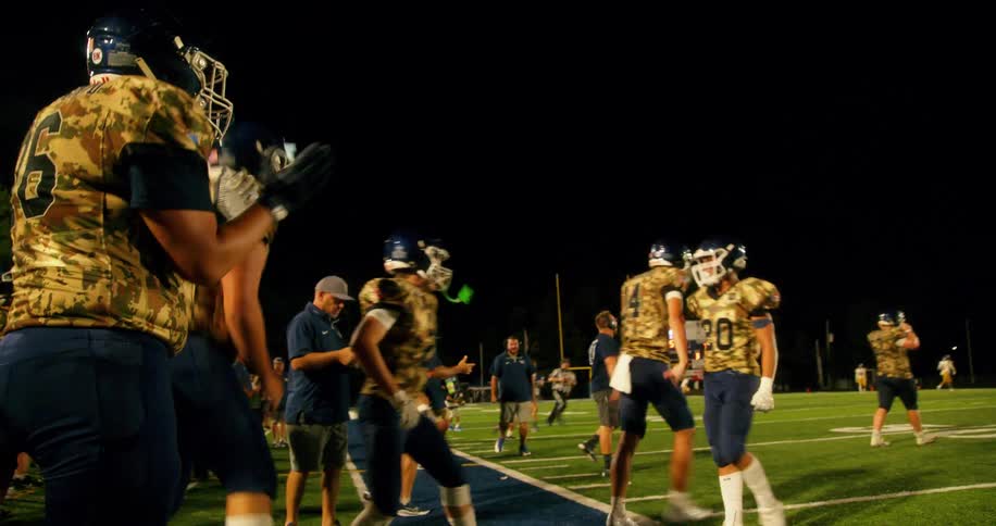American football team celebrating