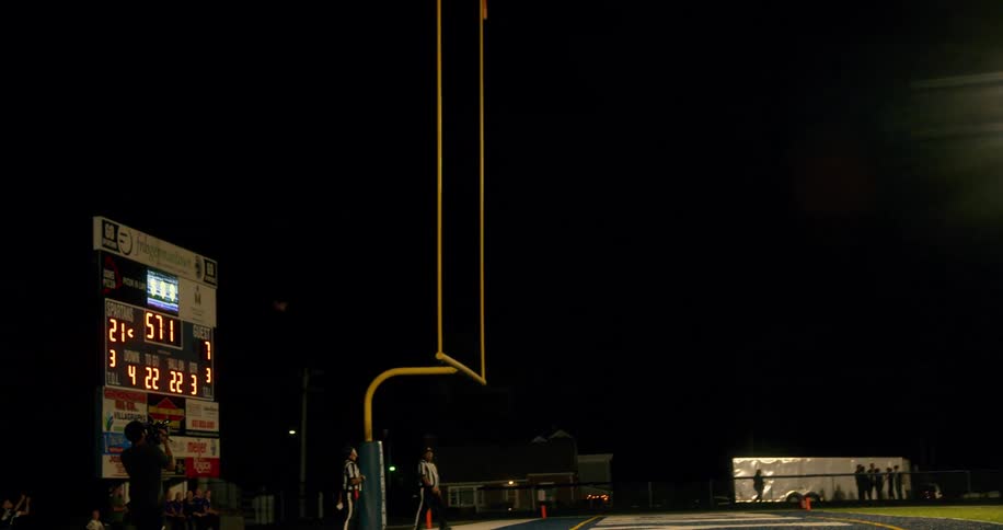 A field goal is scored during a night time football game