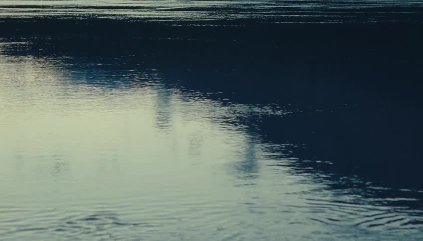 Blue lake with calmly flowing water