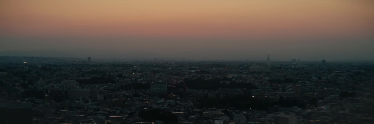 Urban skyline at dusk with the sky in orange tones