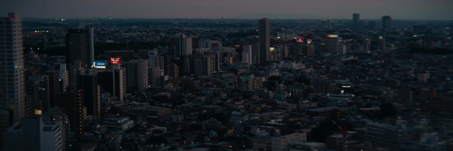 The skyline has a straight row of large towers