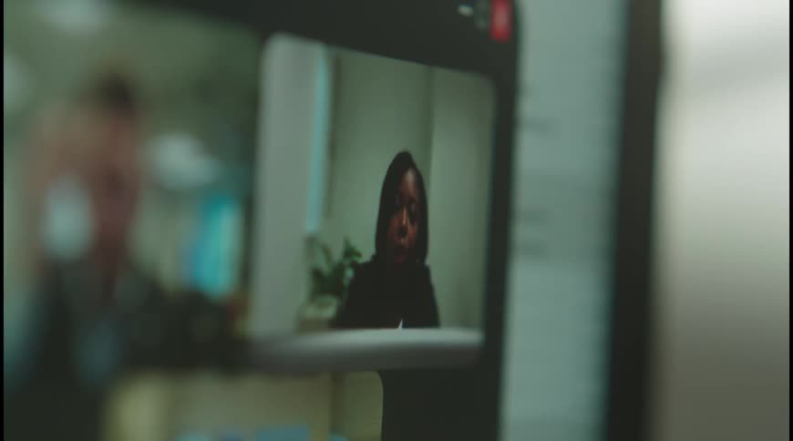The video shows a laptop screen with a video call in progress a person with dark hair is visible on the screen while the rest of the laptop is blurred the focus is on the video call suggesting the importance of the virtual interaction
