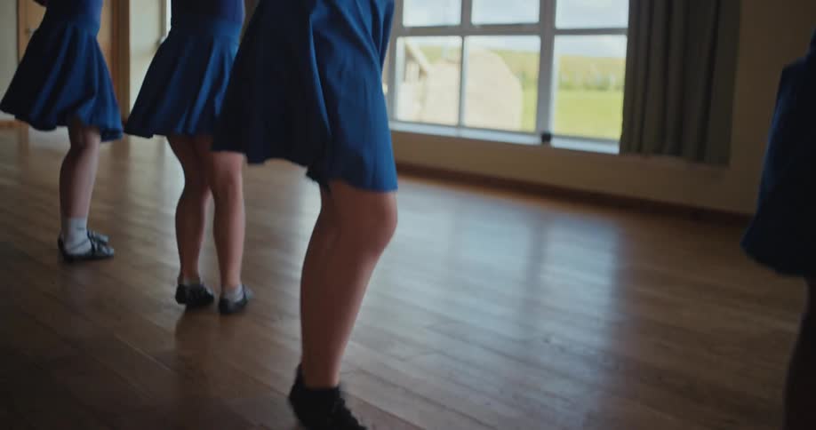Four little girls dancing a ballet choreography