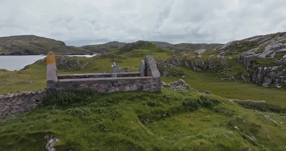 Flying over a green and rocky land