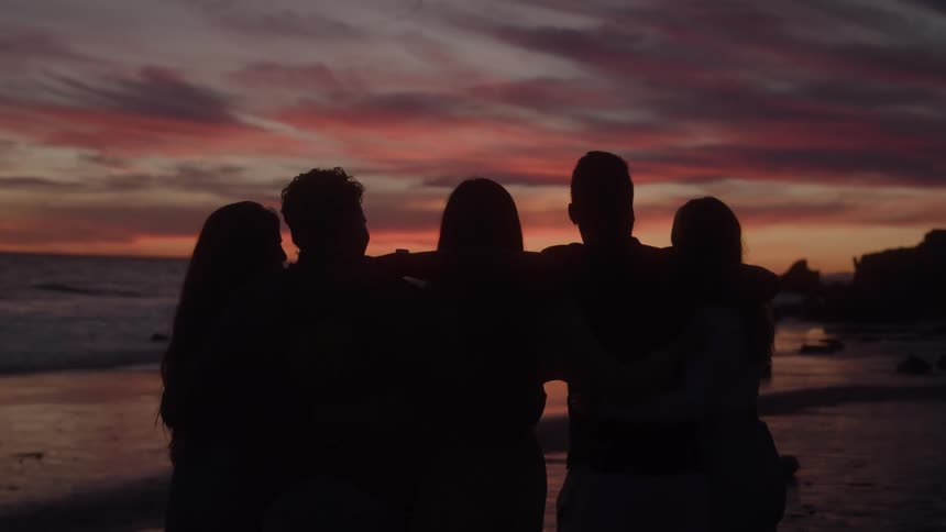 Friends are watching the sunrise together