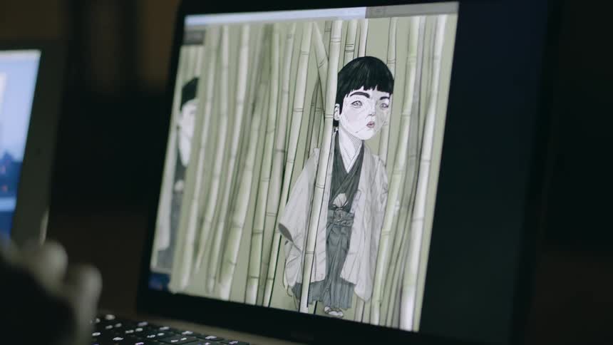 Person editing  something on their laptop screen