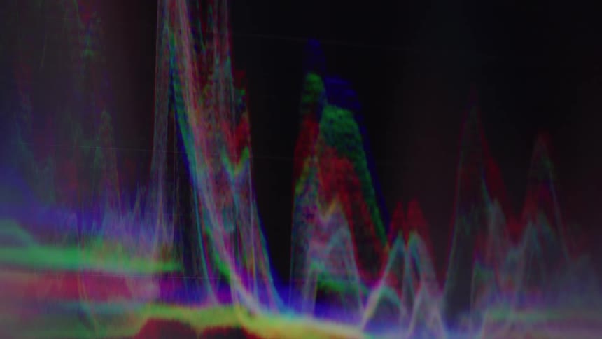 Colorful waveforms form abstract shapes on a dark background