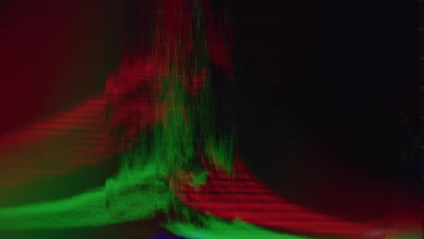 A dynamic video displays a colorful waveform on a black background the waveform shows red and green lines that move in a rhythmic abstract pattern across the screen the lines represent the changing colors and brightness of a video signal