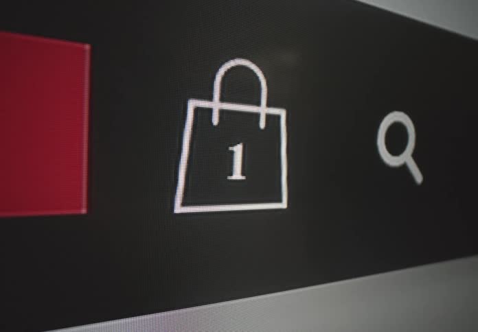 A shopping cart symbol on a website showing an item inside goes to zero