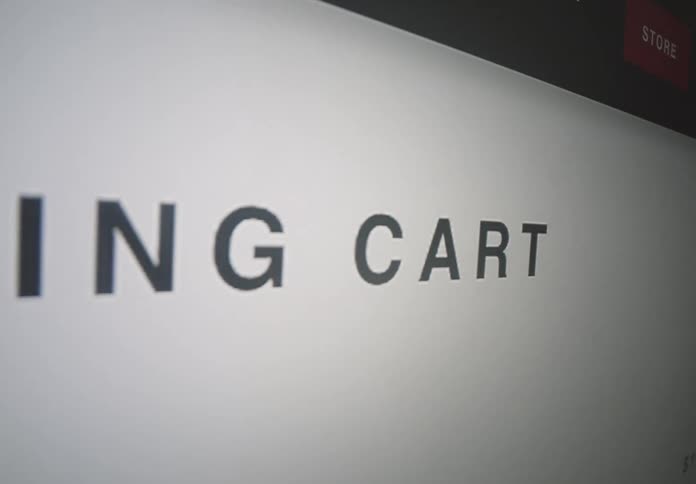 Words in black on a white sign or screen