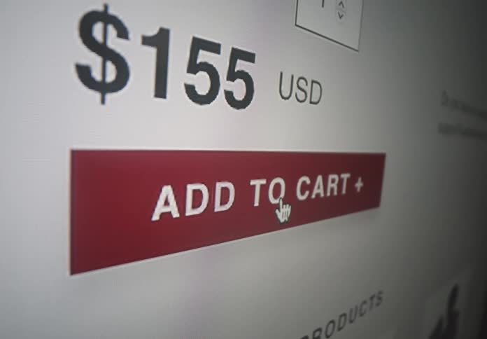 Cursor clicks the add to cart button at an online store