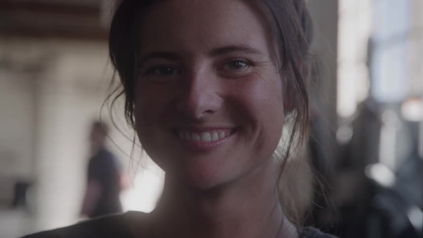 Smiling woman in an indoor space