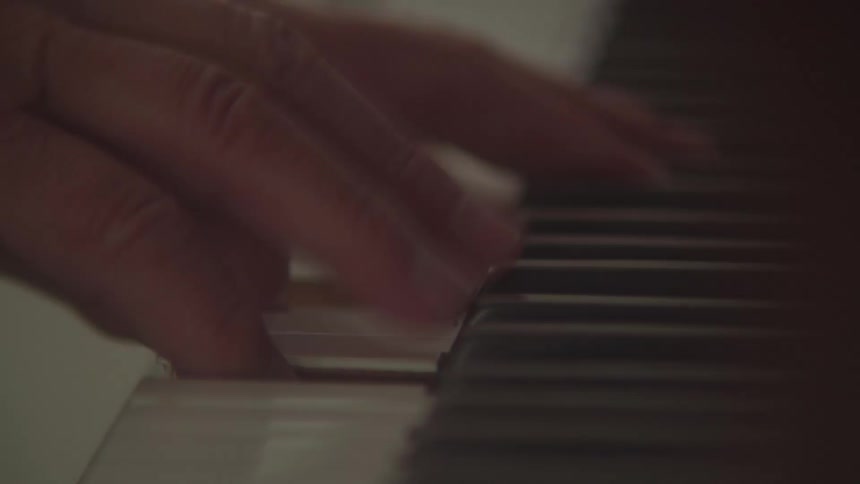 Fingers playing piano