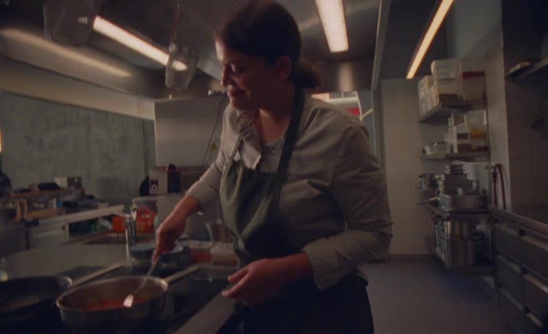 The chef is cooking in the restaurant kitchen