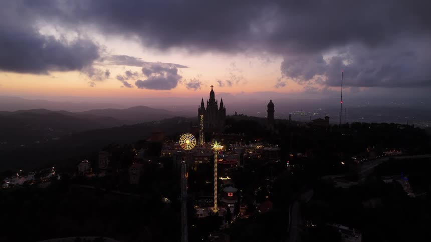 Church illuminated at sunset with clouds in the sky
