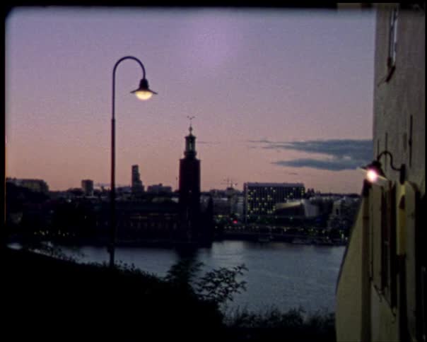 Super-8 timelaps of a city at sunset