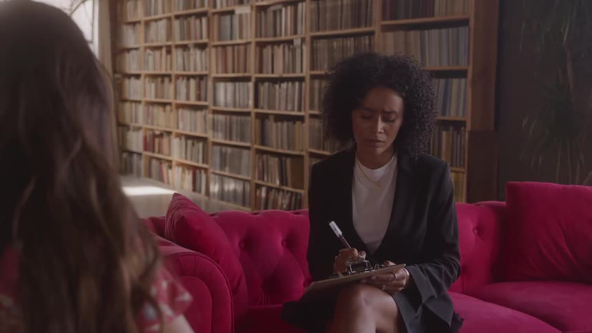 Two woman sitting in a room