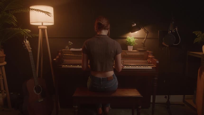 Woman sitting playing piano