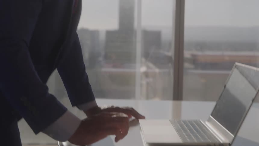 A man at his work desk in an office