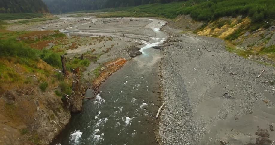 A river flowing through a crevice from an aerial view