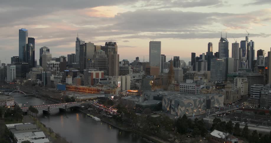 View of a large city with a river flowing down the middle