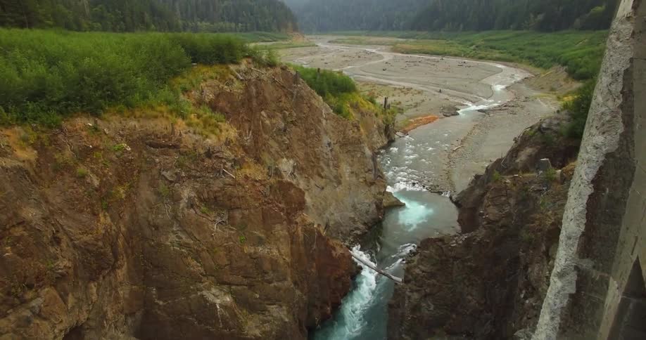 An overhead view of a river flowing through a crevice