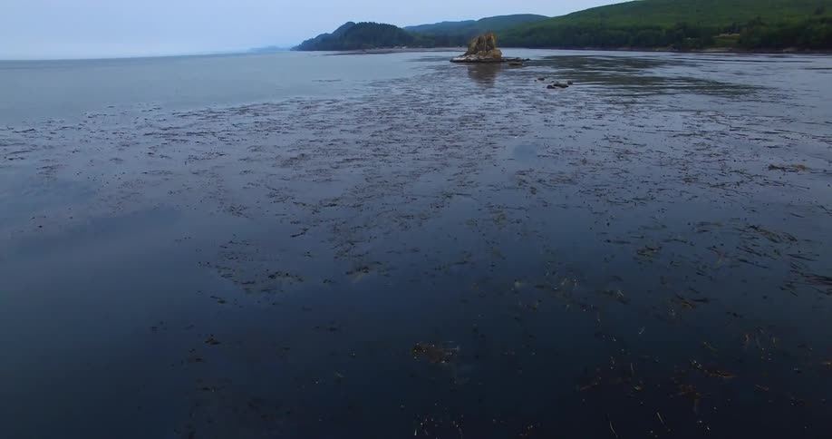 The shallow water leads to a small island