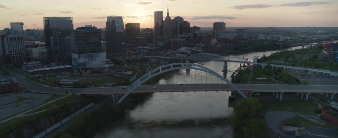 Aerial panorama of a metropolis with skyscrapers and bridges over a river
