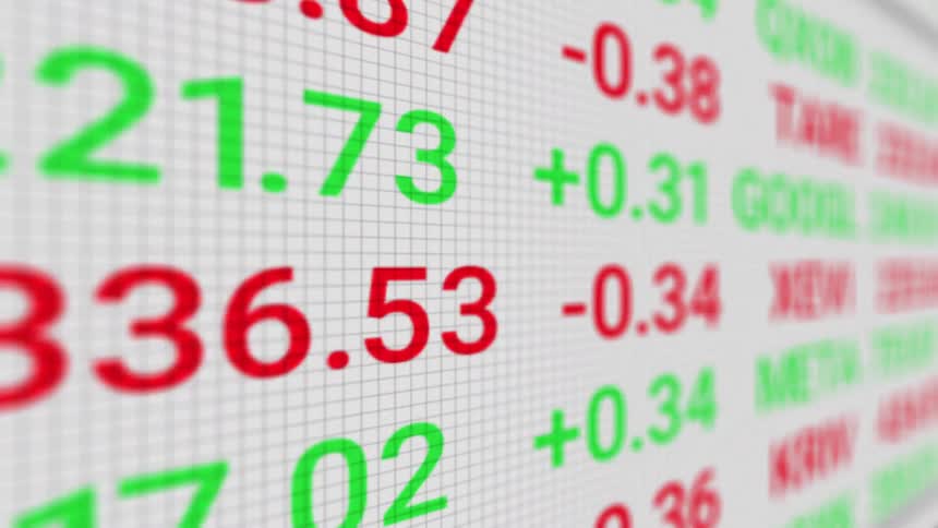 A digital display shows a continuous stream of stock market information with numbers changing in value and color