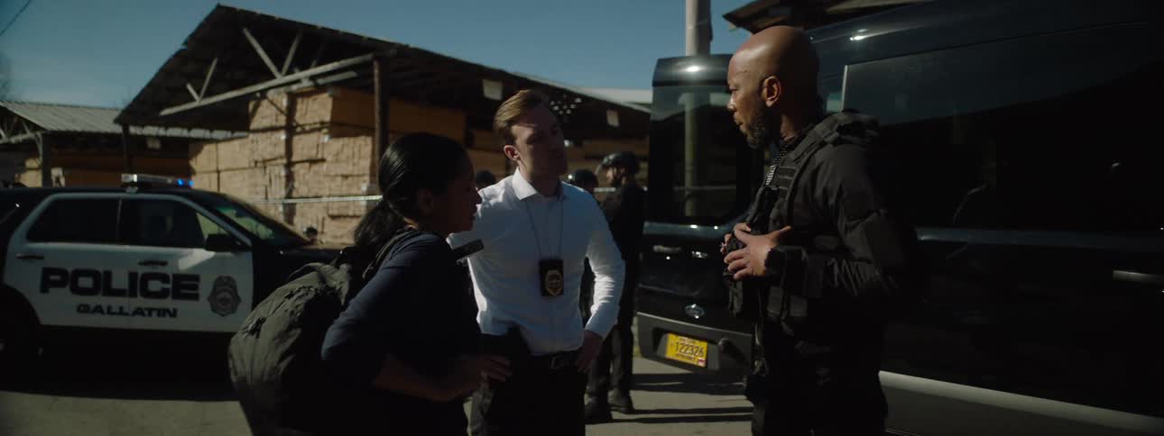 Group of police officers talking during a tactical operation