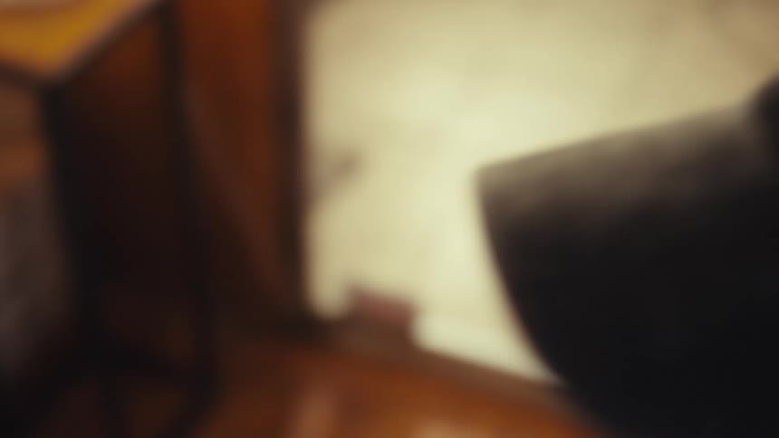 The man holds up his cell phone