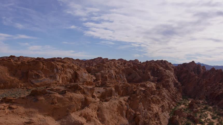 Aerial view of a series of rocky mountains and steep cliffs