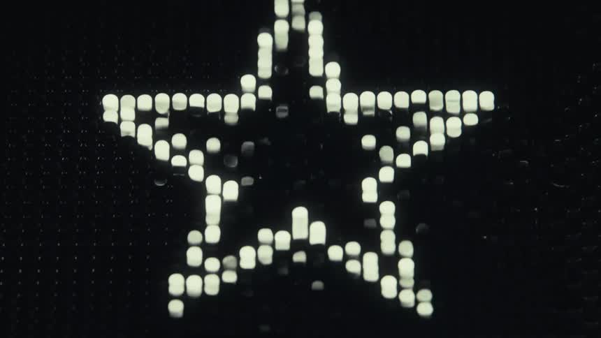 Surface ripples as spheres changing from dark to light form a star shape