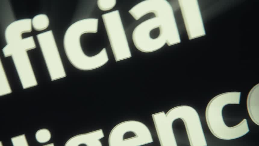 Zoomedin text with the words artificial and intelligence in white on a black background