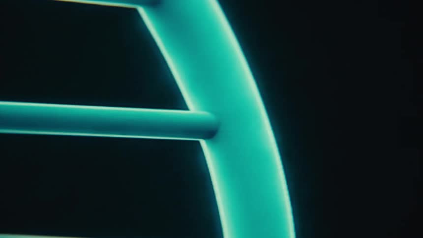 A double helix structure of dna that rotates on a dark background
