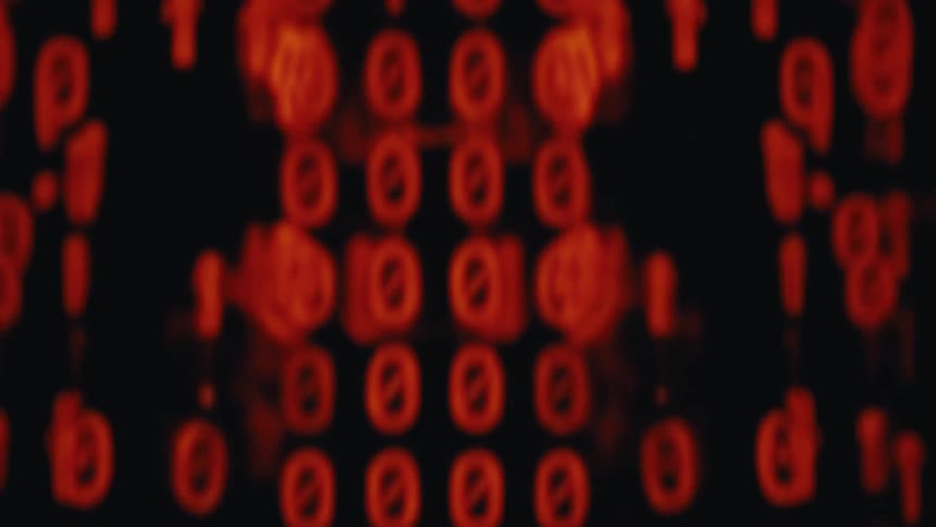 Series of binary numbers in red arranged in columns of zeros and ones on a dark screen