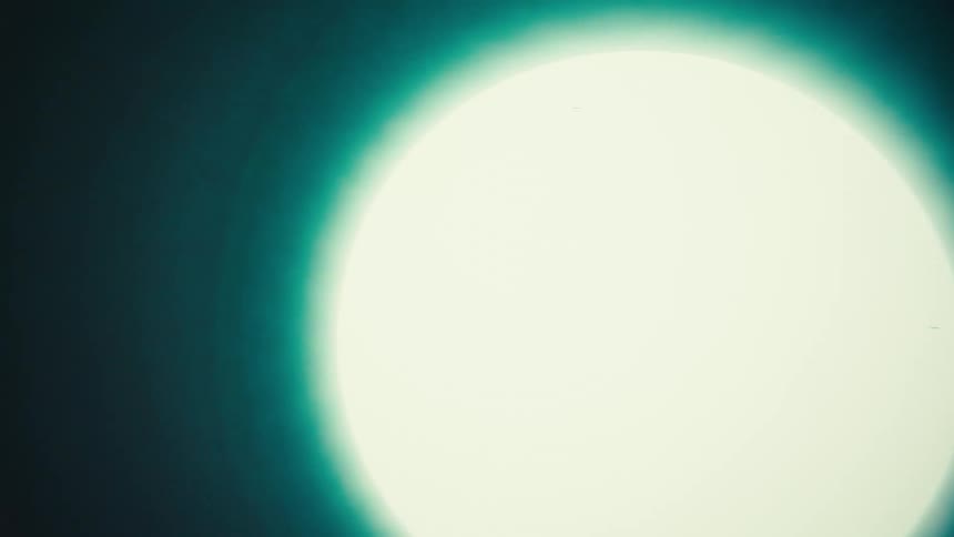 Bright glowing disk contrasts with the surrounding darkness