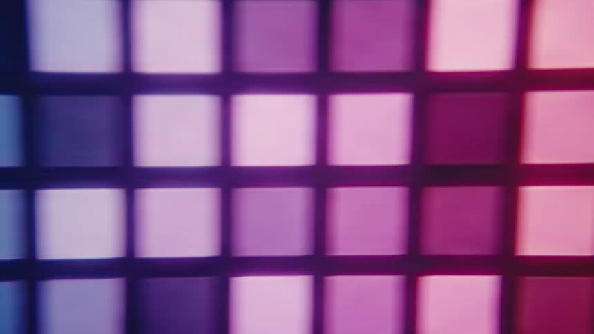 Panel of glowing squares displays shades of green blue and purple