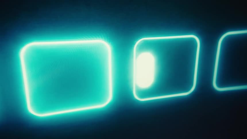 A shot shows an abstract background with squares of light moving and glowing on a dark screen
