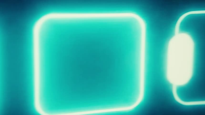 The neon screensaver is playing on the screen